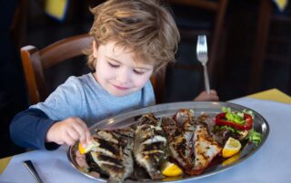 A child at one of the Best Restaurants In Alaska.